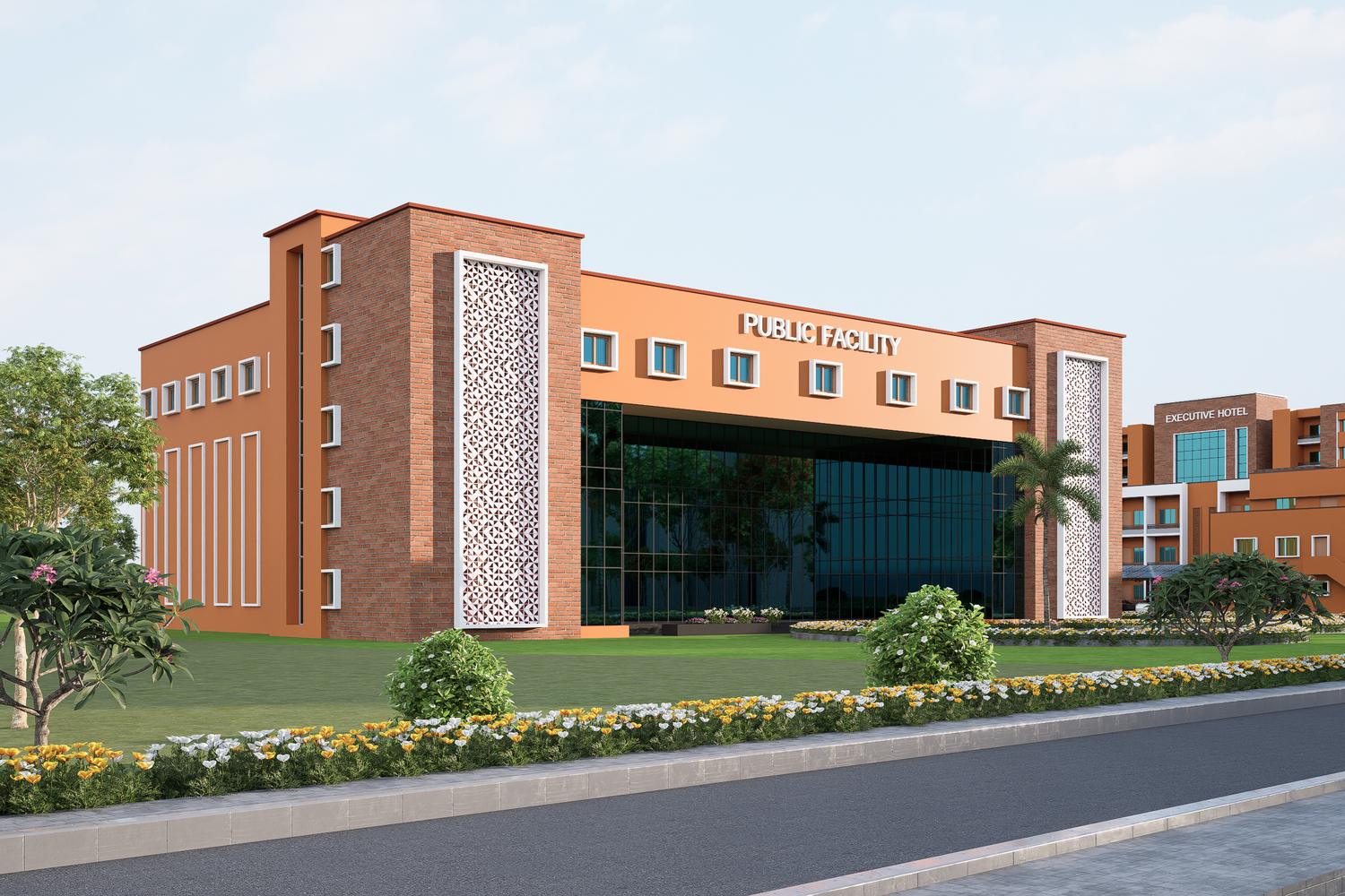 The public facility, its glazed front set between brick towers with white jaali panels