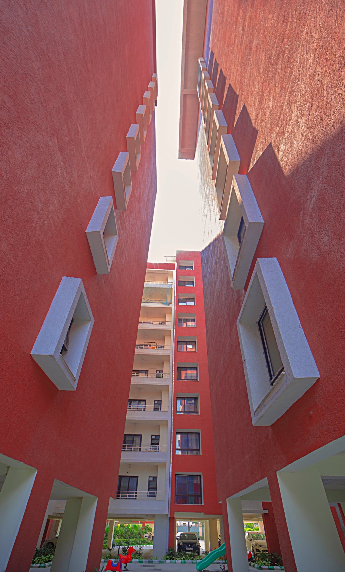 Framed windows in the gap between two towers
